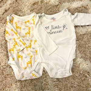 Pair of long sleeved onesies.